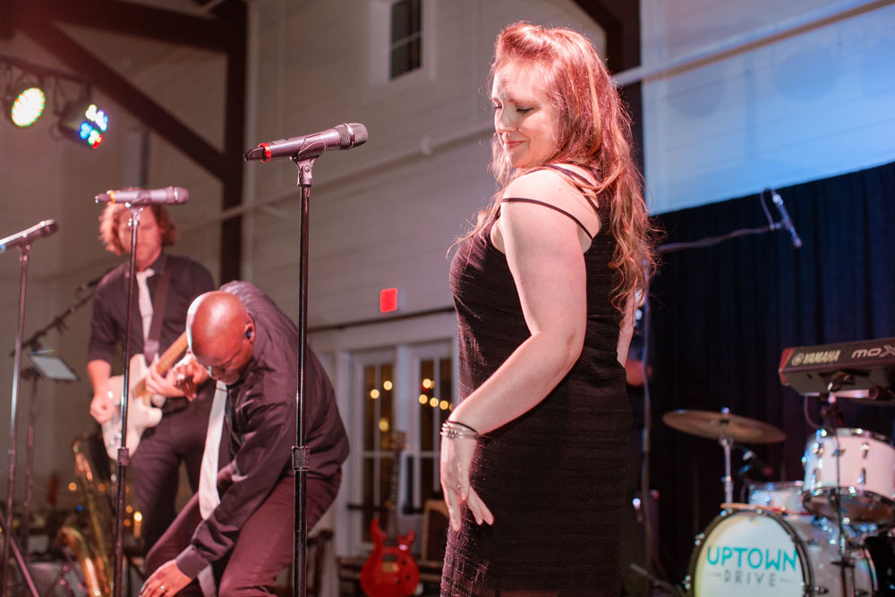 Lead vocalists performing live entertainment for Texas wedding